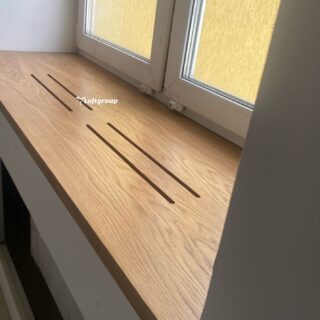 Підвіконня з отворами для радіатора опалення